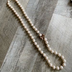 Kate Spade 30” Pearl strand with pretty gold bow clasp